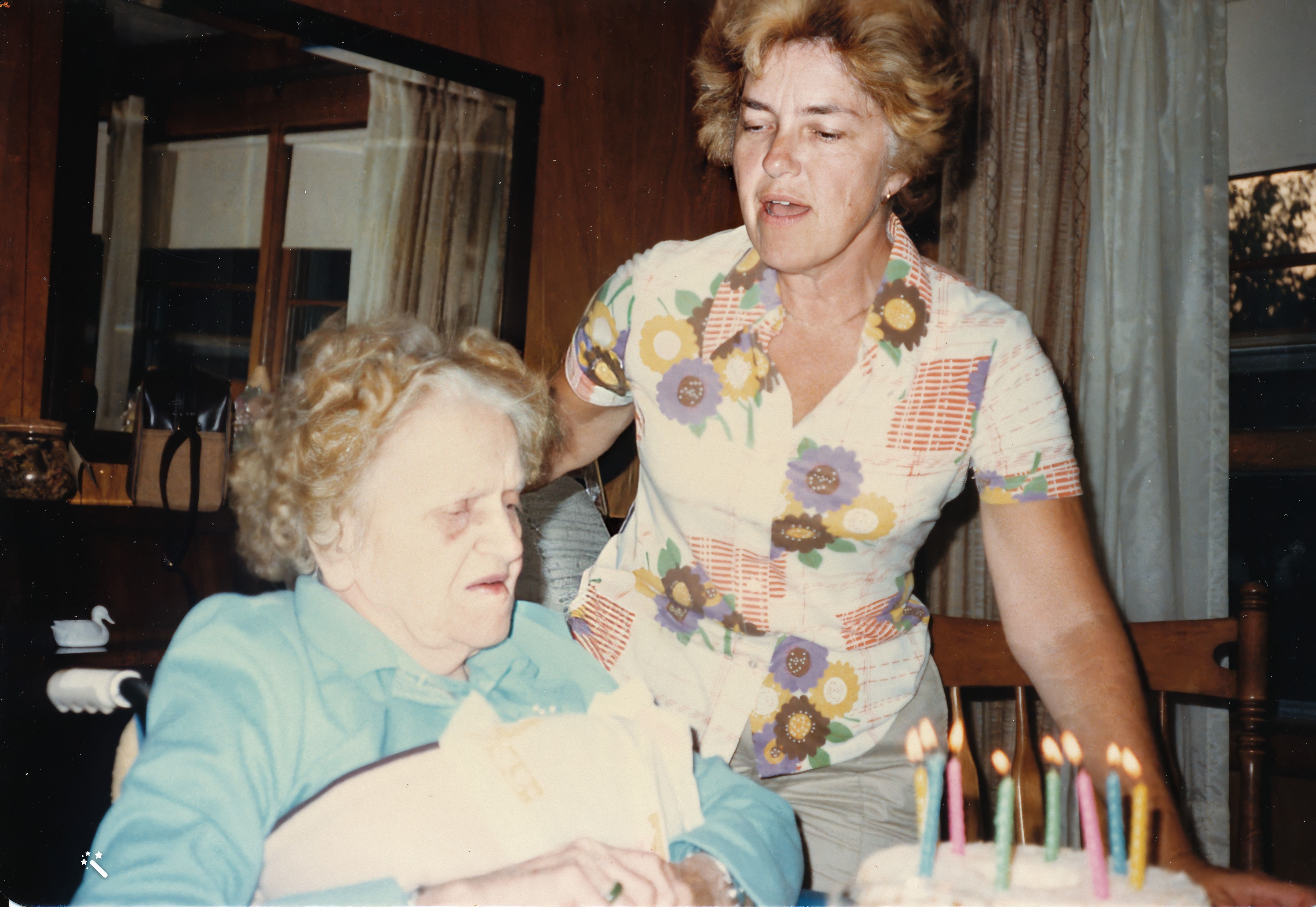 Edith with Arlene blowing out candles