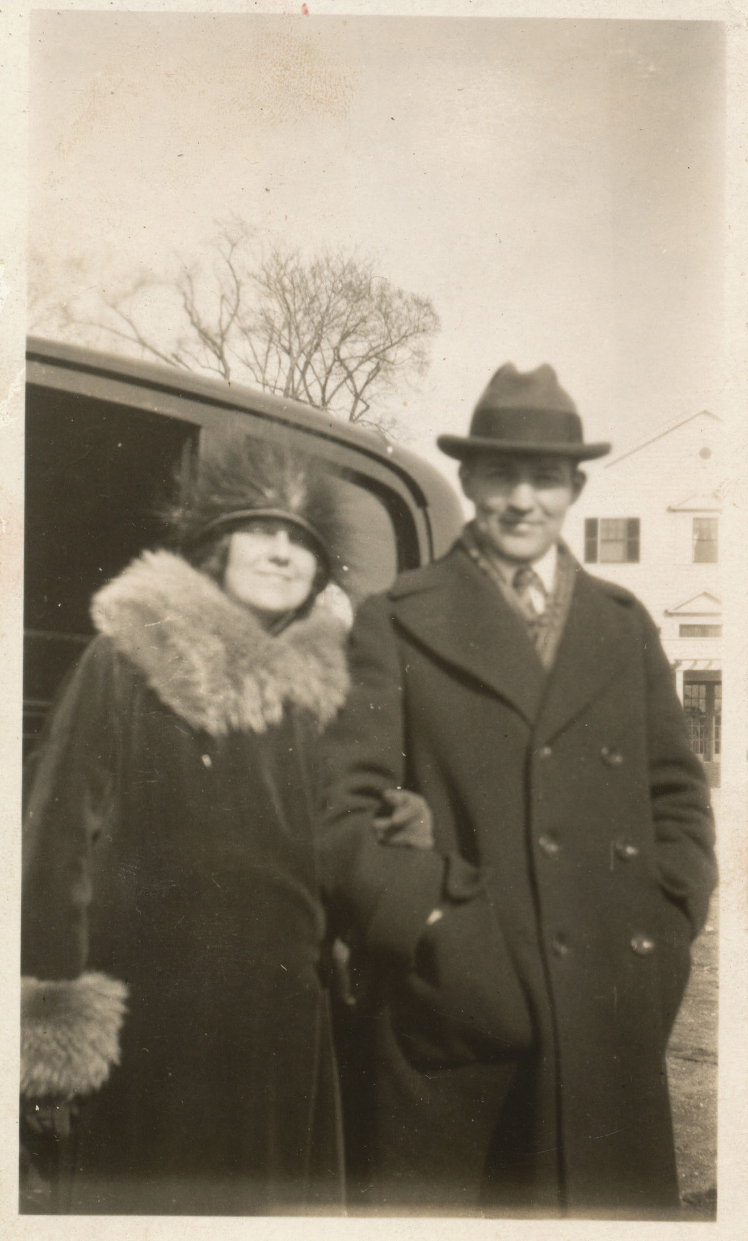 Edith and Philip wearing coats